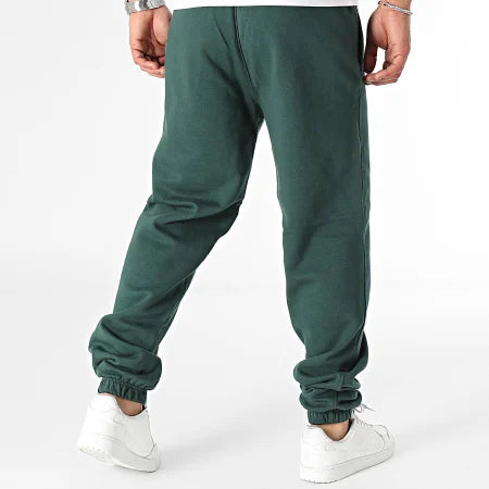 NEW ERA LEAGUE ESSNTLS JOGGER NEYYAN DKGNVY 60424351 | GREEN