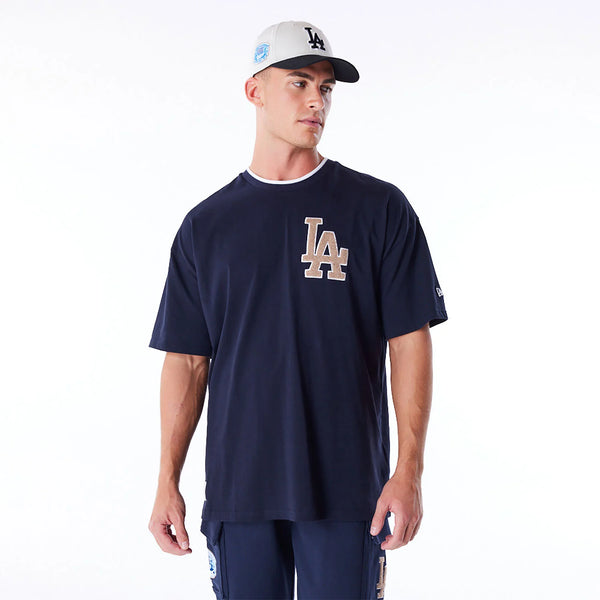 NEW ERA WRLD SRIES DRP SHLDR TEE LOSDOD 60564869 | Navy